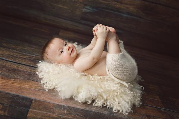 Baby lying on the floor